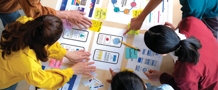 Brainstorm planing creative asian teamwork, Group of asia mobile phone app developer team meeting for share ideas about screen display prototype layout for smartphone, ui, ux startup small business, top view